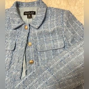 Blue jacket with gold buttons